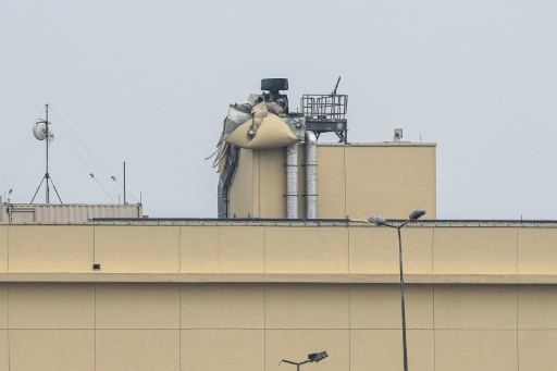 Dégâts occasionnés par une attaque de drone qui a visé l'ambassade américaine à Bagdad, le 14 mars 2026